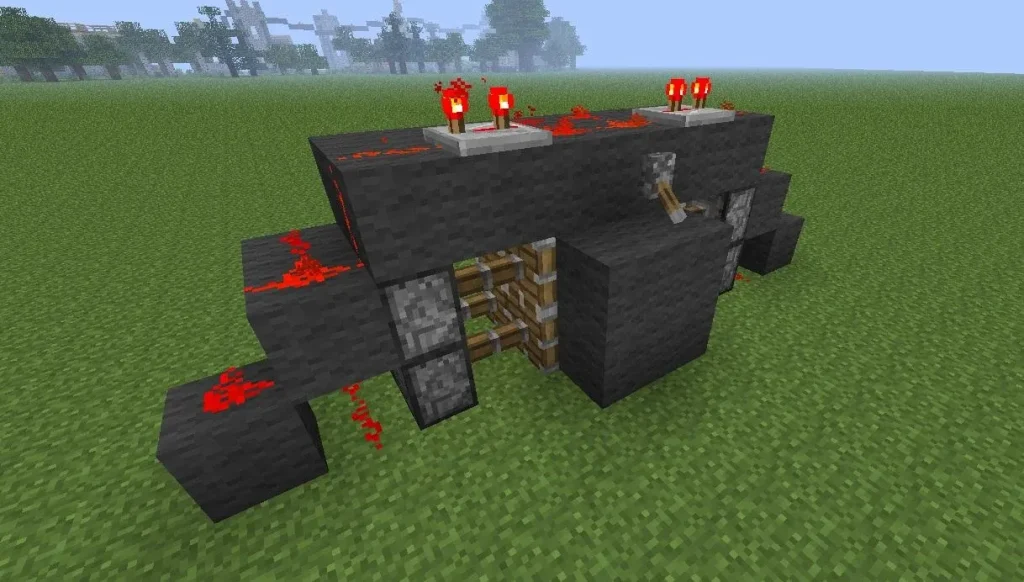 Minecraft Redstone Builds: 5 Useful Ideas You Should Try 2. Hidden Piston Door 2